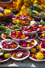 plates of flowers and candles