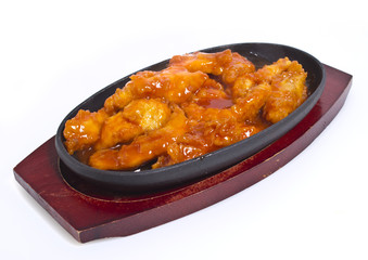 Chicken in thai sauce isolated on white background
