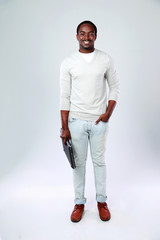 Naklejka premium Handsome african man isolated