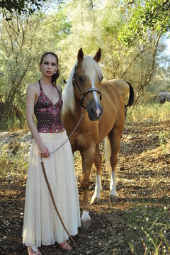 Young lady with horse