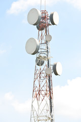 communication towers on sky background
