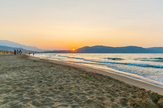 Beach on sunset in village Kavros in Crete  island, Greece.