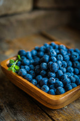 Blueberries on wooden background