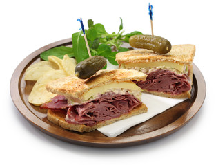 reuben sandwich with pastrami and swiss cheese