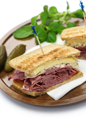 reuben sandwich with pastrami and swiss cheese
