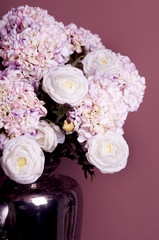 bouquet of roses and hydrangea in a vase