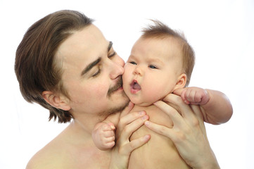 Dad smelling newborn baby