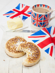 Buttered English crumpets with cup of tea