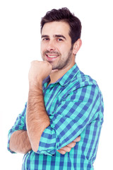 Portrait of a casual latin man smiling, isolated over a white ba