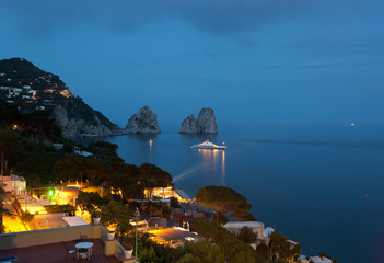 Faraglioni by night, famous giant rocks, Capri island