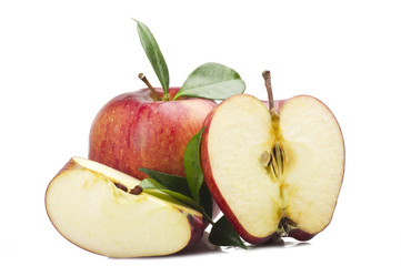 Red apple and leaves on the  white