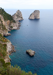 Fototapeta na wymiar Faraglioni, famous giant rocks, Capri island