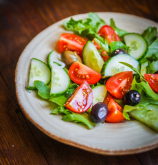 Vegetable salad on wooden background