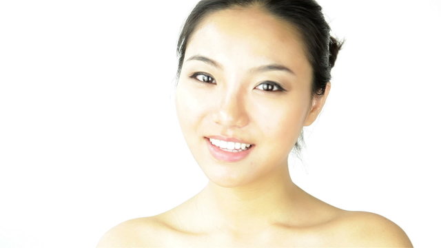 Attractive asian woman on white