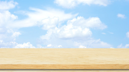 Fototapeta premium Wooden table and blue sky.
