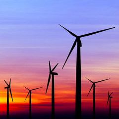 wind turbine silhouette on colorful sunset