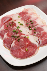Fresh Beef slices on white plate korean grilled menu