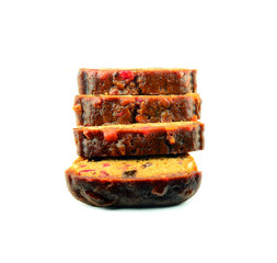 A traditional Christmas fruit cake isolated on a white backgroun