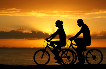 Fototapeta na wymiar Couple Riding Bikes