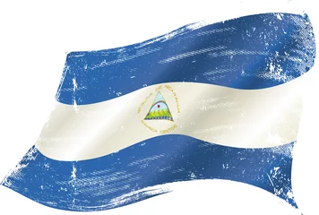 Fotobehang waving Nicaraguan grunge flag © christophe BOISSON