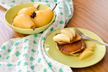 pear stewed in citrus juice and pancakes