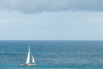 Fototapeta premium Sailing sloop in the Caribbean V