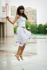 Jumping smiling girl