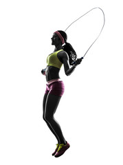 woman exercising fitness jumping rope  silhouette