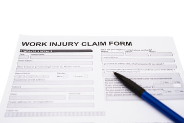 Fototapeta premium work injury claim form on white with clipping path