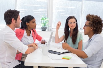 Fototapeta premium Business people having a meeting together