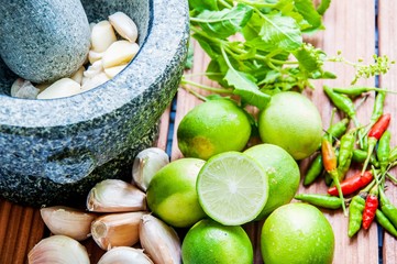 stone mortar with ingredients for Thai cooking