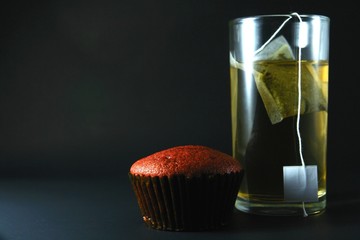 Red Velvet cupcake and a glass of tea