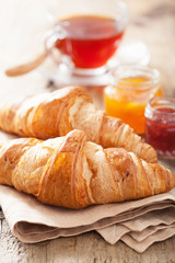 fresh croissants with jam for breakfast