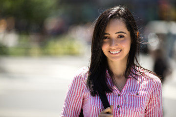 Young Latina Hispanic woman happy face portrait