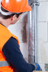 Engineer locating a gutter