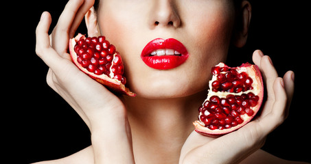 woman with Pomegranate. professional makeup