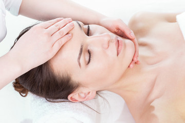 Obraz na płótnie Canvas Woman having face massage