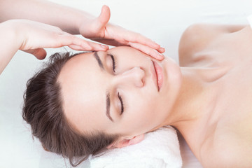 Lady during face massage