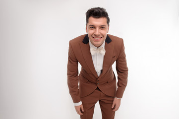 Man in brown suit
