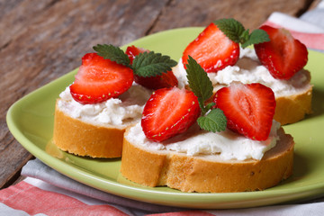 Sandwiches with fresh strawberries, mint and cream cheese