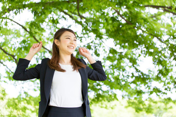 young asian woman on green background