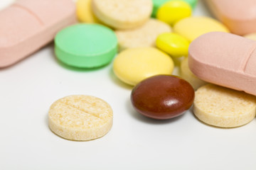 pills, ampule and capsule drug on white