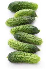 gherkin, garden fresh cucumbers isolated on white background