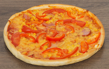 Pizza with bacon and tomato