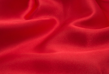 red satin or silk fabric as background