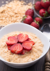 Oatmeal breakfast with strawberries