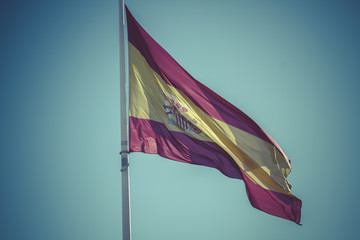 Spanish national flag. Plaza de Colon in Madrid, Spain.