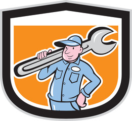 Plumber Holding Wrench Shield Cartoon