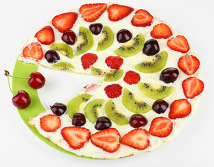 Homemade sweet pizza with fruits isolated on white