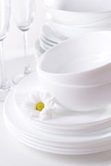 Set of white dishes close-up